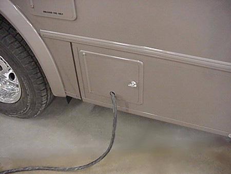 SECTION 6 ELECTRICAL An access hatch in the compartment floor or door lets you route the shoreline cord out of the compartment and shut the compartment door while the shoreline is connected.