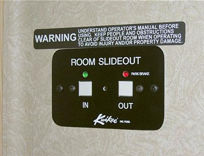 The slideout room system uses a 12-Volt DC motorized room mechanism to insure smooth operation and positive weather seal.