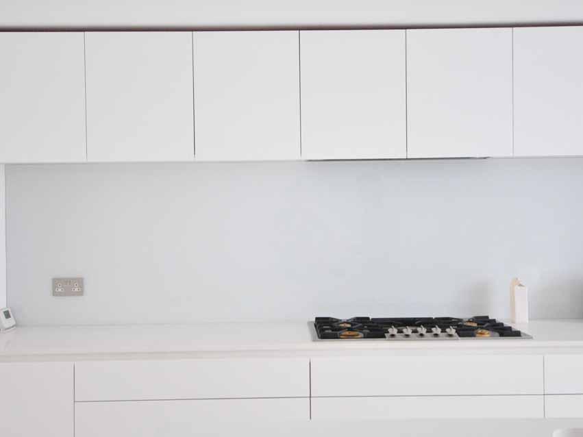DESIGNERS AND SPECIFIERS Corian Doors in the Kitchen This linear kitchen design by Higham Furniture perfectly