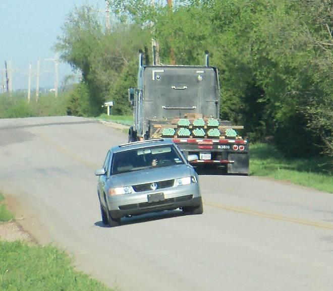 PRIMARY SELECTION CRITERIA SAFETY The current CR 611 is a 2-lane asphalt road. There are no turn lanes for large trucks or delivery trucks into commercial businesses along the road.