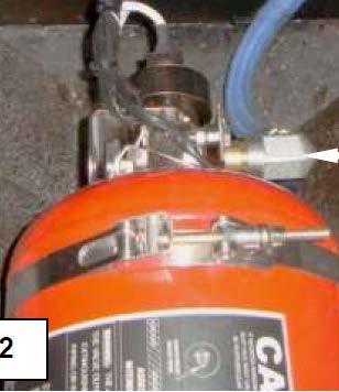 bracket and install it on the valve outlet port on the extinguisher assembly.
