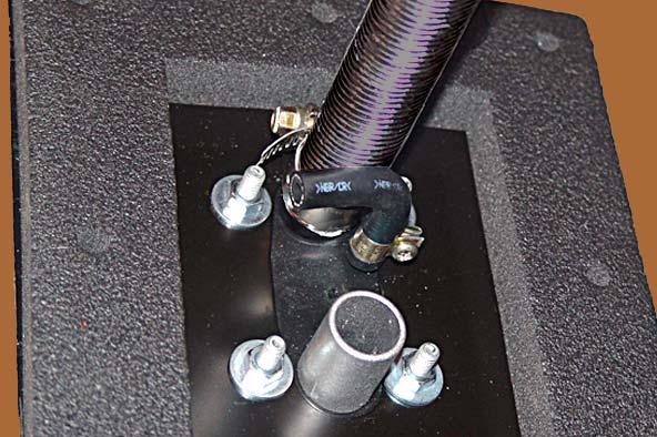 Install air intake tube and fuel line coupler on heater before mounting heater to floor.