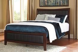 B470 Dirmack (Signature Design) Metro modern styling made with Okoume veneers and hardwood solids Finished in a medium chestnut brown Headboard and footboard feature broad channel-tufted upholstered