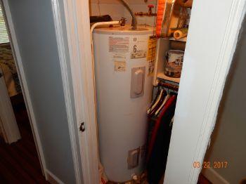 1. Water Heater Condition Water Heater Heater Type: electric Location: The heater is located in the hall closet. Water Heater GE year 2000. The unit is past its functional life.
