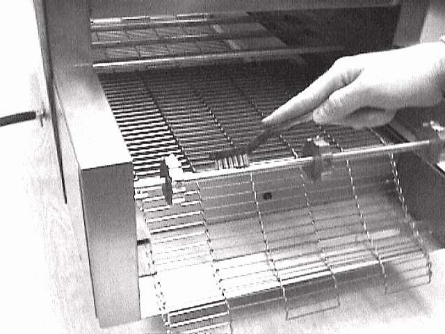 9) Pull upper section of Conveyor Belt through oven cavity.