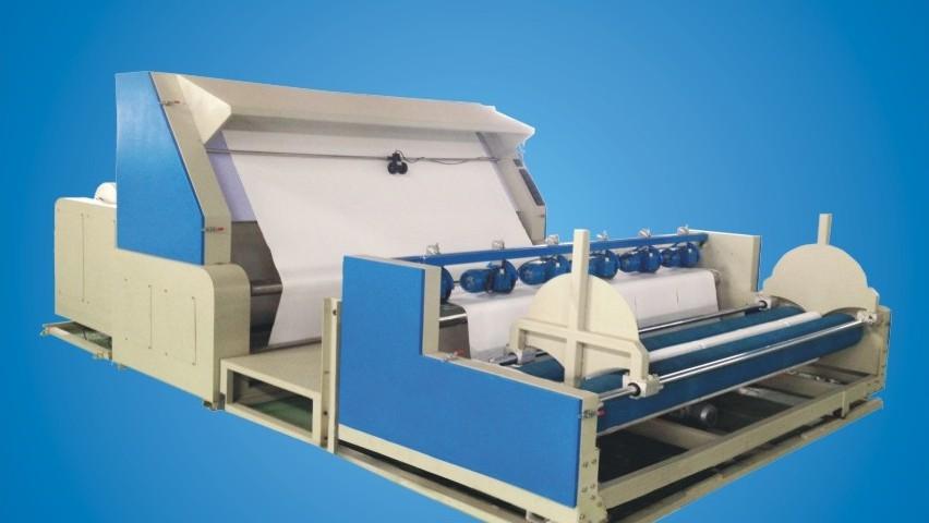 Automatic Slitting Machine This machine is specifically designed for wide cloth inspection and slitting. Material may be slit in a specific width.