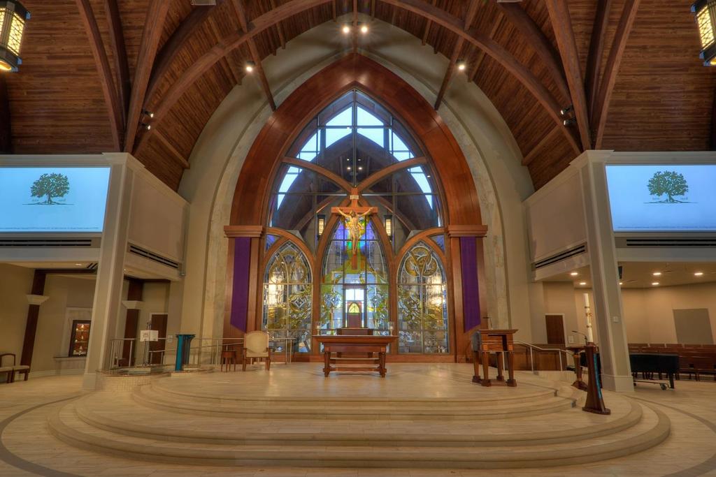 A1.08 Parishioner donated stained glass is located throughout the church illustrating sacraments and biblical
