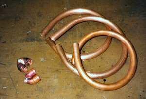 The resulting design used much larger bore copper pipe and with fewer coils.