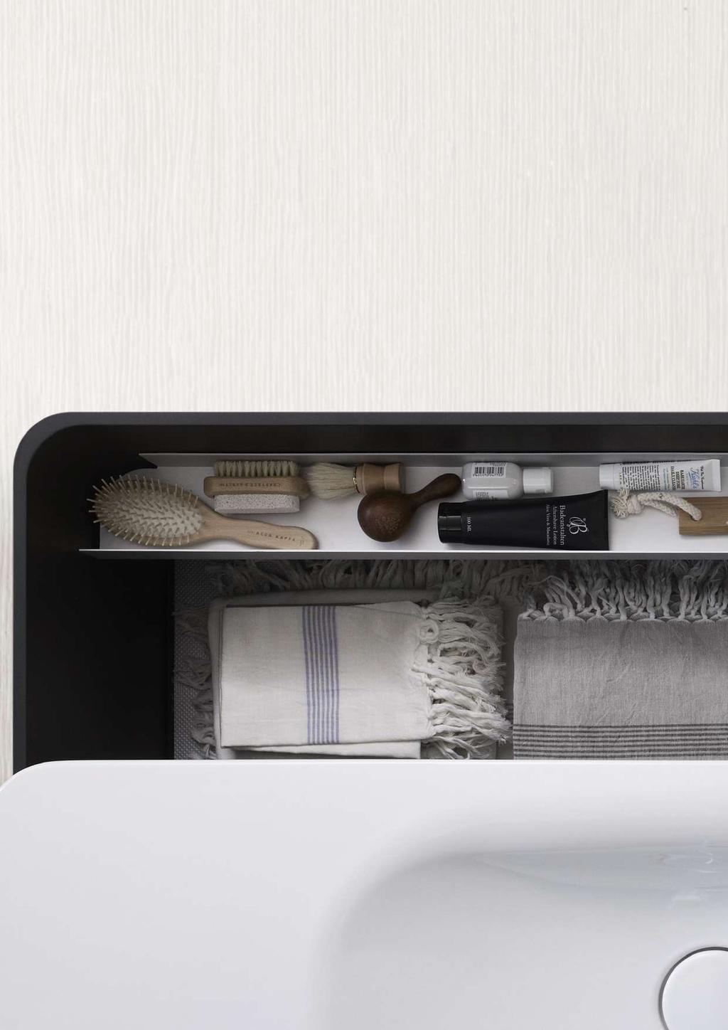 CREATE YOUR PERSONAL SPACE A washbasin above. A drawer below. That is all! The vanity unit consists of one large drawer only.