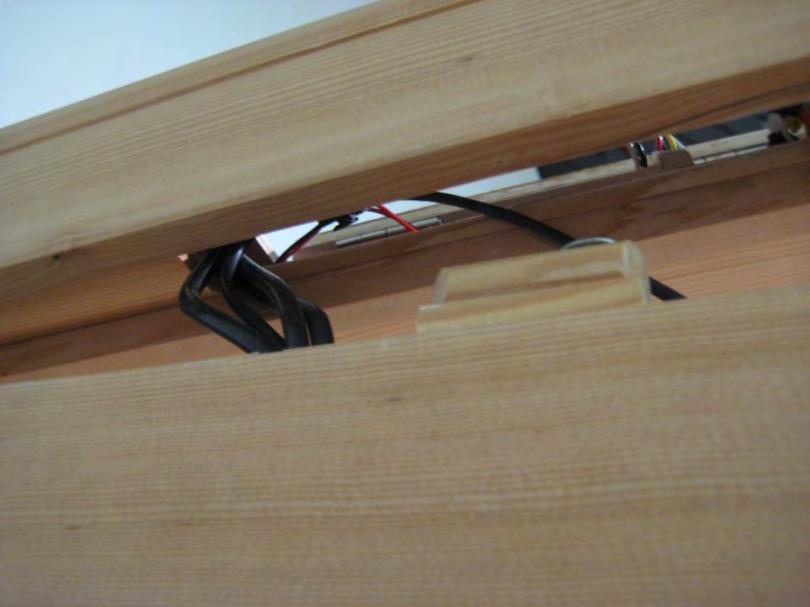 Once the Ceiling panel is lined up directly above the Wall panels; insert the wires harnesses from the wall