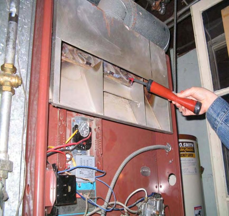 On a draft hood furnace, spillage is tested using smoke, matches, or a mirror, to check for the presence of combustion