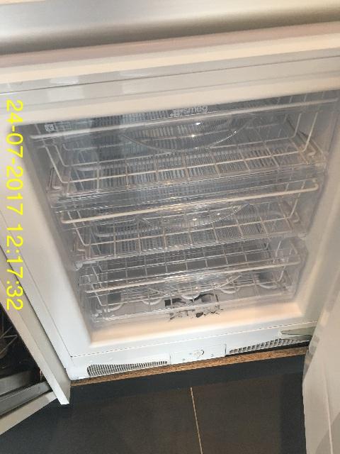 1 Freezer BEKO 10e Small white freezer beside the fridge. 9.1.1 - Kitchen - Washing Machine 9.