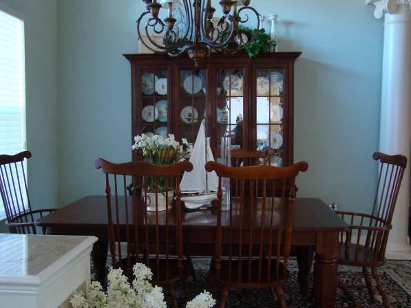 The dining room is just to your left as you enter the house with the living room spreading out in front of you.