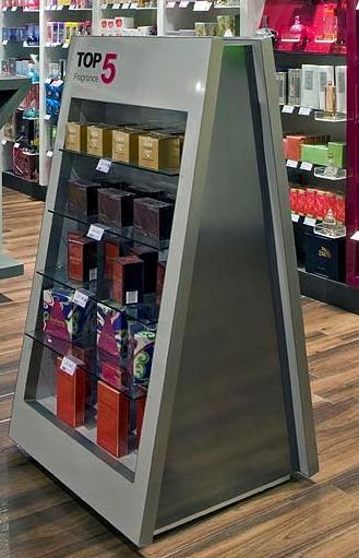 customers with illuminated header signage, and an A frame fragrance unit for consumers to browse the