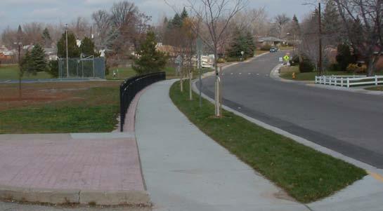 Design also included new school drivecuts and updating site handicap ramps to meet ADA standards requiring