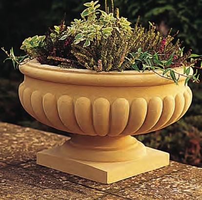 this elegant bowl is a Haddonstone design featuring a square base with gadrooning to the bowl.