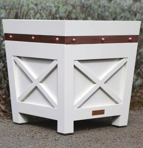 THE STUD PLANTER A beautiful elegant planter that proudly boasts solid copper studs, a horizontal copper strip and cross detailing. Made in Accoya and spray painted in any colour of your choice.