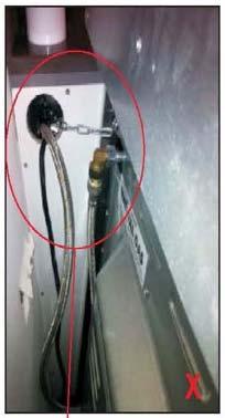The chains should be connected to the wall directly behind the chains as low as possible to prevent the appliance from tilting forward.