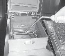 Use care to prevent burns caused by splashing of hot shortening. Step 7b c. Rinse the frypot interior. Especially work on hard to clean areas, like the frypot bottom.