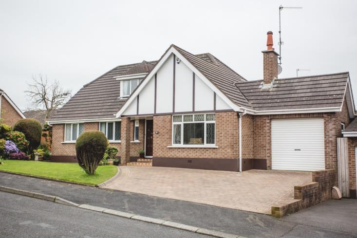 No 8 CARLTON HILLS, BARONSCOURT, CARRYDUFF BT8 8BZ A well-appointed detached chalet style home which occupies a mature, private corner position in a popular residential neighbourhood just off the