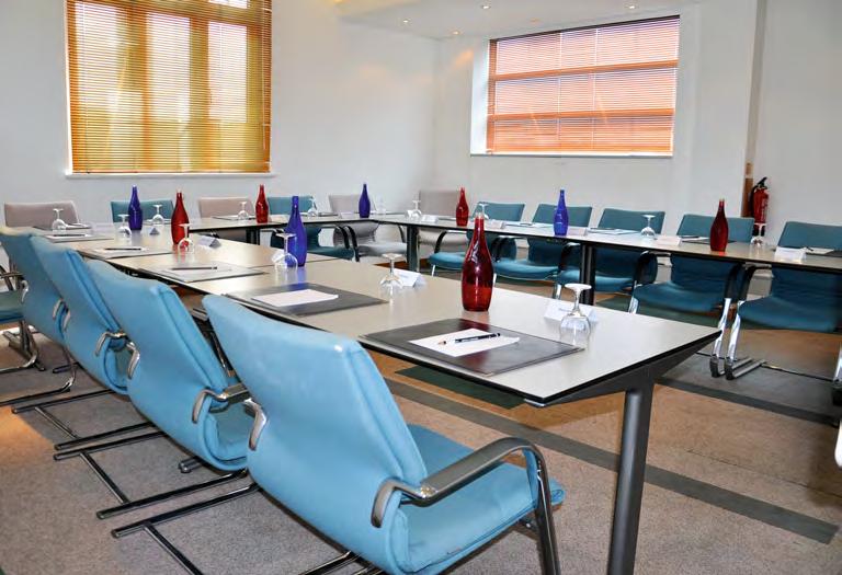 5th Floor Meeting Room (CHROMIUM) Ideal for formal meetings, this room seats up to 16 guests in a board table layout.