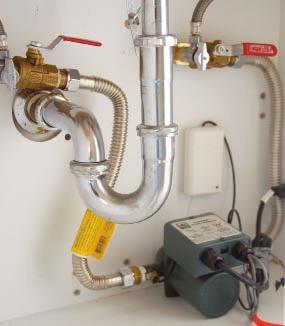 When the pump is activated, the slug of cool water in the hot line is pushed back to the water heater via the cold-water line.
