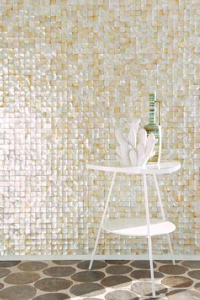 Shells and mother-of-pearl revisit rock walls in an array of natural shades and materials in a random layout.