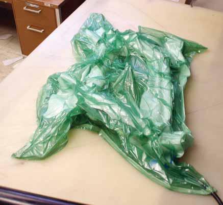 For instance, to make a flat layup such as an extra thick spacer, you could use painter s plastic for the bag, kitchen sponges to soak up the excess epoxy, Dacron material from the fabric store (that