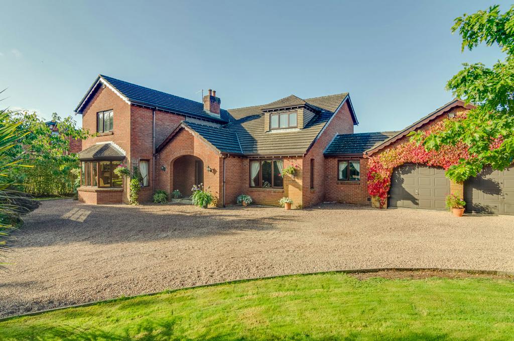 This attractive detached family home is situated on an excellent semi rural site in a quiet location just off Ballynahinch Road on the outskirts of Lisburn.