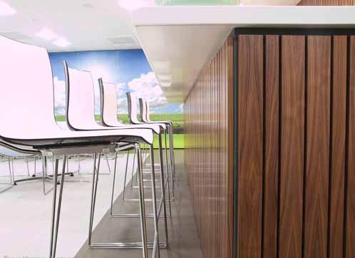 Above: Bespoke walnut panelling provided this office fit out with a