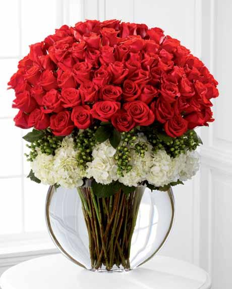 LX22 lavish 75 Freedom 60 cm Roses 12 Green Hypericum Berry stems 7 White Hydrangea blooms Approx. 33"h x 26"w DELIVERED SRP $339.