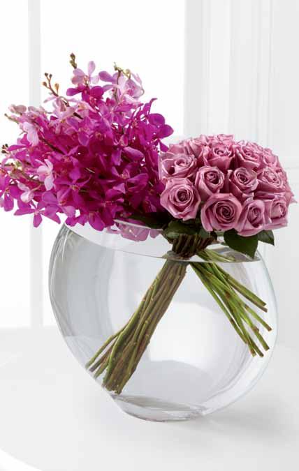 This beautiful pairing of purple Mokara Orchids and lavender roses is overflowing with harmony.