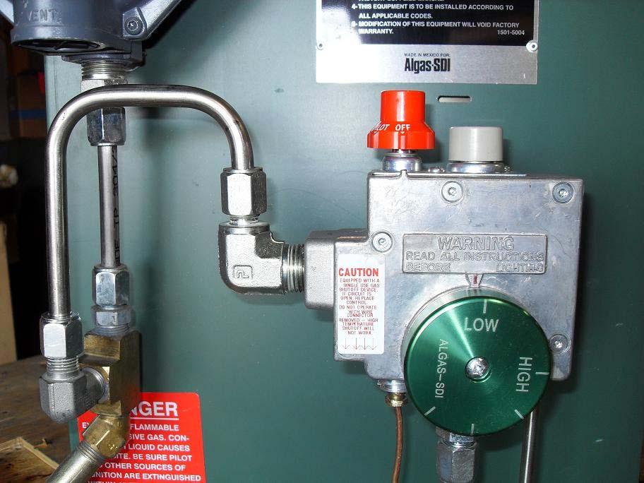 CAUTION: Prior to venting and removing the thermostat all sources of ignition within 50 feet must be eliminated. REMOVING ROBERT SHAW THERMOSTAT 5. REMOVE FITTINGS AND TUBE 2. REMOVE TUBE 3.