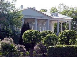 Its identifying Ionic or Corinthian columned porches often extend the full height of the house.