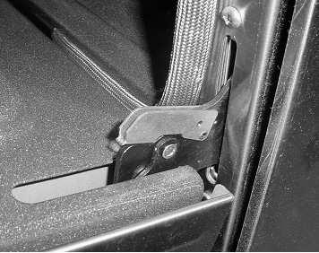 Open the door fully and use a screwdriver to carefully pry the hinge clips away from the hinge slots (Photo A). 2. Flip the hinge clip toward you (Photo B). 3.