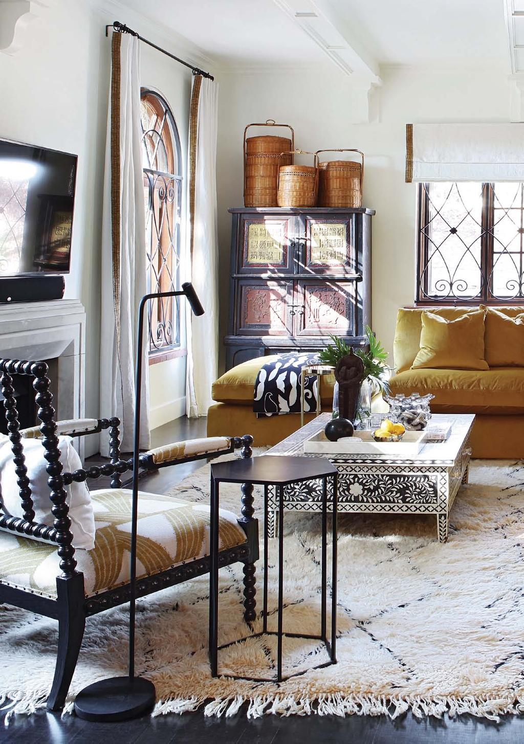 A Berber carpet from Gonsenhausers Fine Rugs grounds the lounge in this Jo burg home.