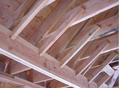 Dropped perimeter ceiling soffits were used to maintain the thickness of the insulation near the perimeter and still be able to provide