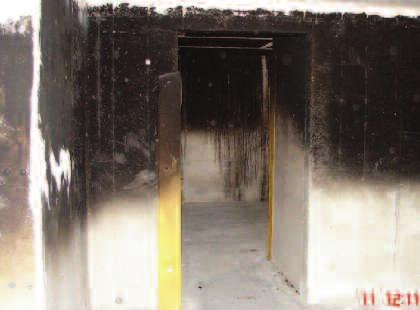 construction implemented in the burn room as well as the deluge sprinkler head. Windows and exterior doors were constructed to be non-combustible. Windows were fabricated from 0.25 in.