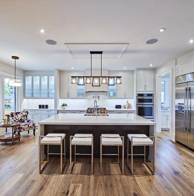 Stunning Chef's Kitchen The custom kitchen showcases a butler's pantry, a