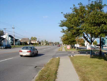 Suburban: Suburban refers to corridors serving newer residential subdivisions and arterial or collector roadways serving non-local traffic and which typically support