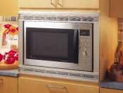 6 countertop microwave oven in a wall or cabinet alone, or over a 30" or 27" single electric wall oven as shown.