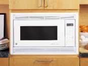 1.5 cu. ft. Profile Microwave Ovens Built-in trim kits allow installation in a wall or cabinet alone, or over a 30" or 27" single electric wall oven.
