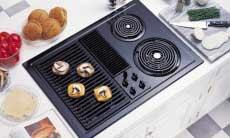 Griddle accessory has a non-stick coating and is self-draining.
