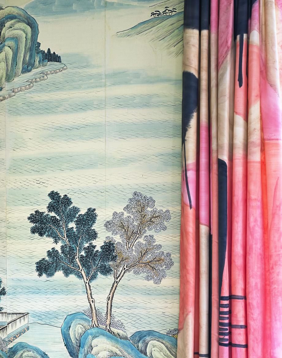 fantasy island bolds & brights In the dining room of a South Carolina beach house, Charleston-based designer Angie Hranowsky paired her client s 1920s wallpaper panels with curtains in a