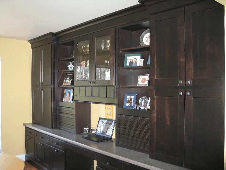 Wall-to-Wall View of Decorative Dining Piece/Home Office Storage Unit The wall-to-wall custom hutch and cabinets in the dining area beautify the space with floor to ceiling storage.