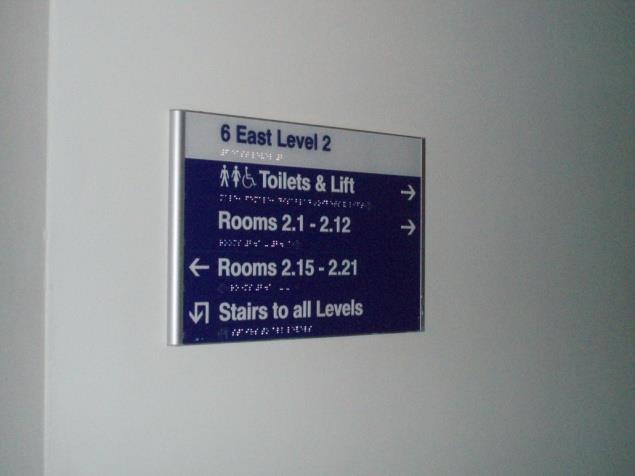 Internal Signage Specification DDA Wayfinding signs follow the Sign Design Guide Tactile text 20mm cap ht in Helvetica 55, 1mm thick onto 1.5mm Rowmark matt plastic.
