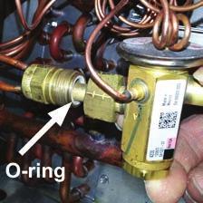 Inspect the TXV box to confirm that the valve is compatible with the refrigerant in the system. III-6.