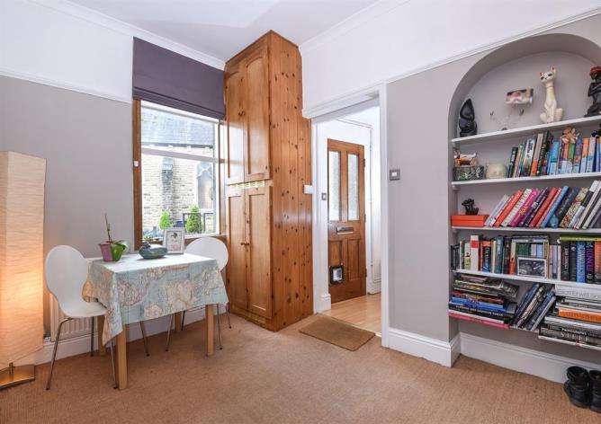 sash windows, three original fireplaces, stripped wooden floors and also benefits from a brand new contemporary shower room suite.