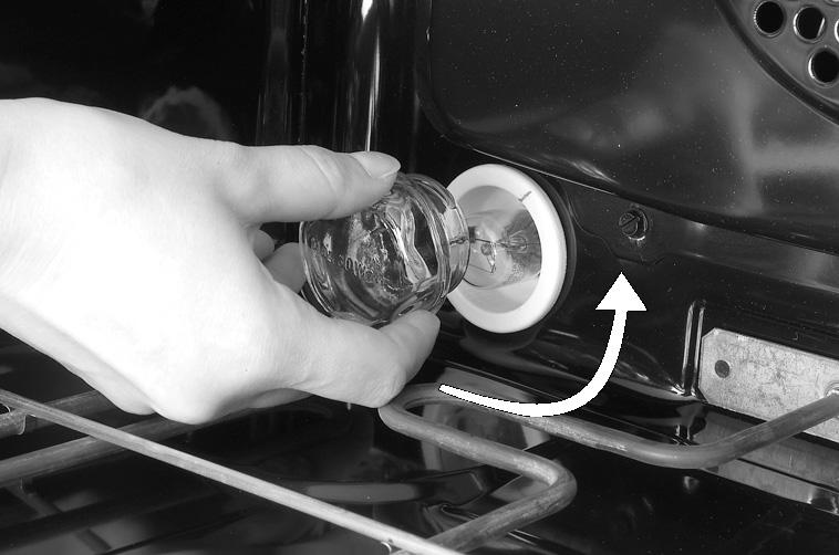 Changing the rear oven lamp bulb (if provided): 1. Disconnect the oven from the electrical supply. 2. Let the oven cool before turning the lamp cover left to unscrew it (see fig. 1). 3.