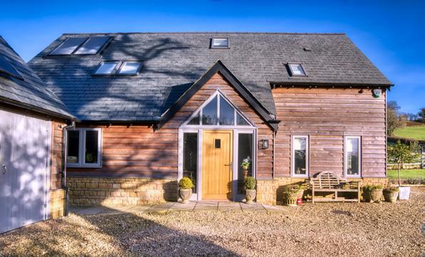 co.uk Dovre wood-burning stove and Esse range cooker Mendip Stoves: mendipstoves.co.uk Ground floor First floor FLOORPLAN The barn has a double-height atrium and dining room through the centre of the ground floor, with a large utility room and separate lounge.